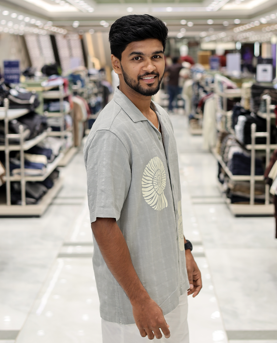 Grey Poly-Blended Causal Shirt, Comes with Shell Motifs Print, Half Sleeves, a Cuban Collar, a Boxy Fit, and Regular Length