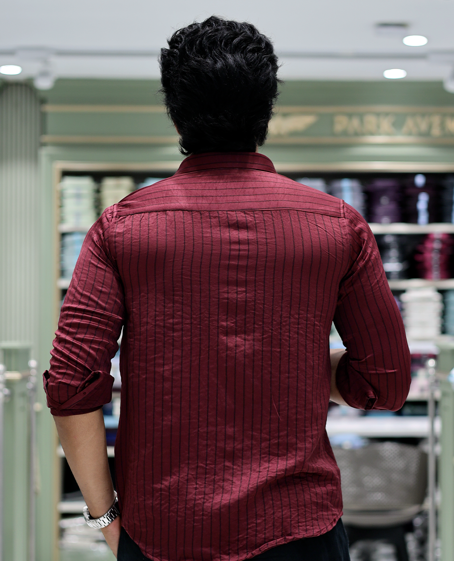 Maroon Striped Poly-Blended Formal Shirt Comes with Full Sleeves, a Spread Collar, a Slim Fit, and a Regular Length