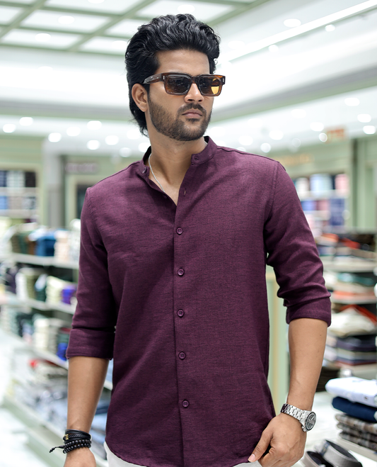 Plum Solid Cotton-Blended Casual Shirt Comes with Full Sleeves, a Mandarin Collar, a Regular Fit, and a Regular Length
