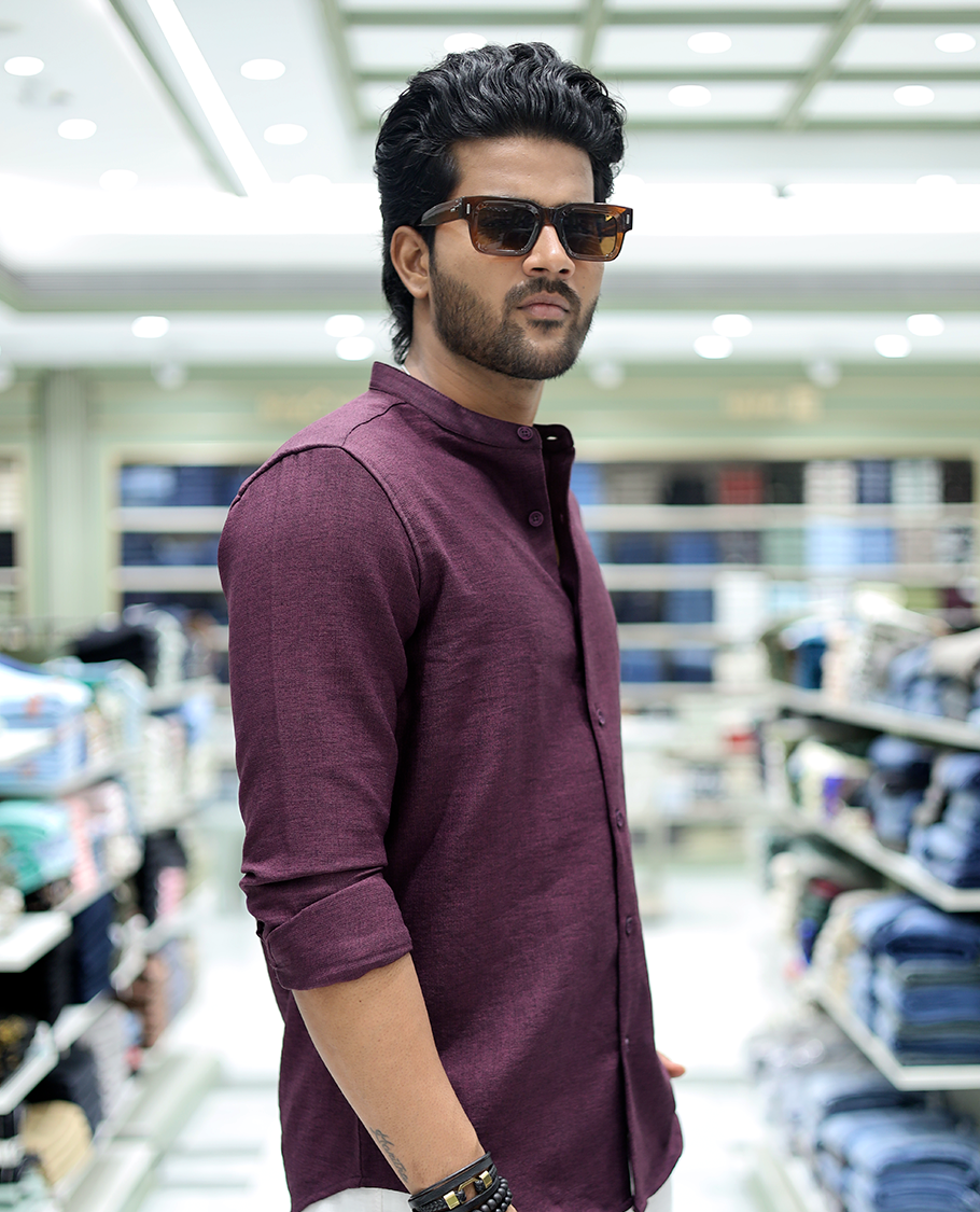 Plum Solid Cotton-Blended Casual Shirt Comes with Full Sleeves, a Mandarin Collar, a Regular Fit, and a Regular Length