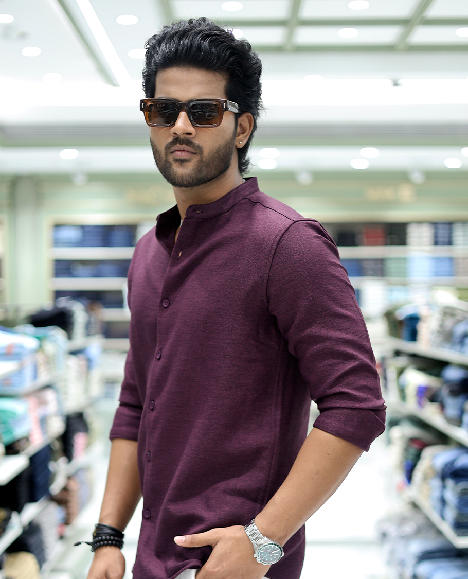 Plum Solid Cotton-Blended Casual Shirt Comes with Full Sleeves, a Mandarin Collar, a Regular Fit, and a Regular Length
