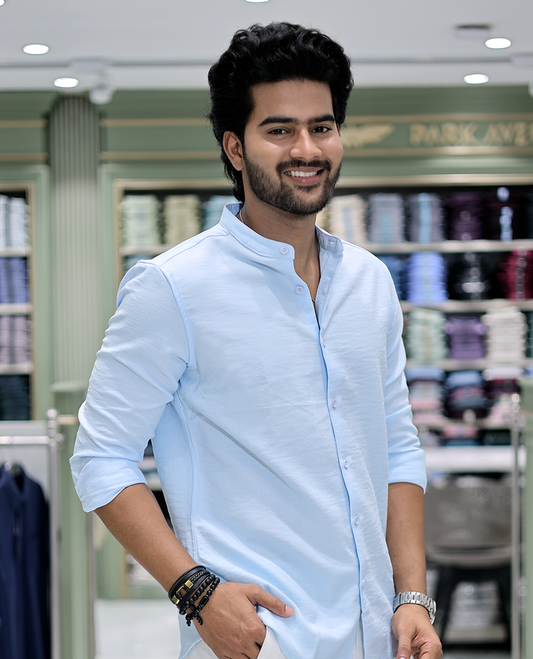 Light Blue Solid Cotton-Blended Casual Shirt Comes with Full Sleeves, a Mandarin Collar, a Regular Fit, and a Regular Length
