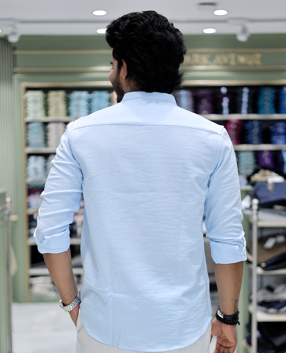 Light Blue Solid Cotton-Blended Casual Shirt Comes with Full Sleeves, a Mandarin Collar, a Regular Fit, and a Regular Length