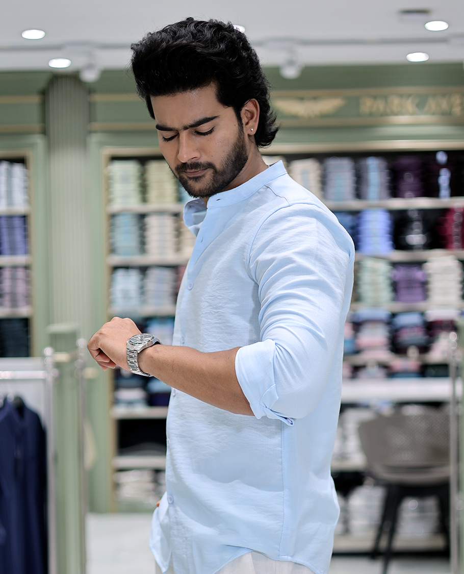 Light Blue Solid Cotton-Blended Casual Shirt Comes with Full Sleeves, a Mandarin Collar, a Regular Fit, and a Regular Length