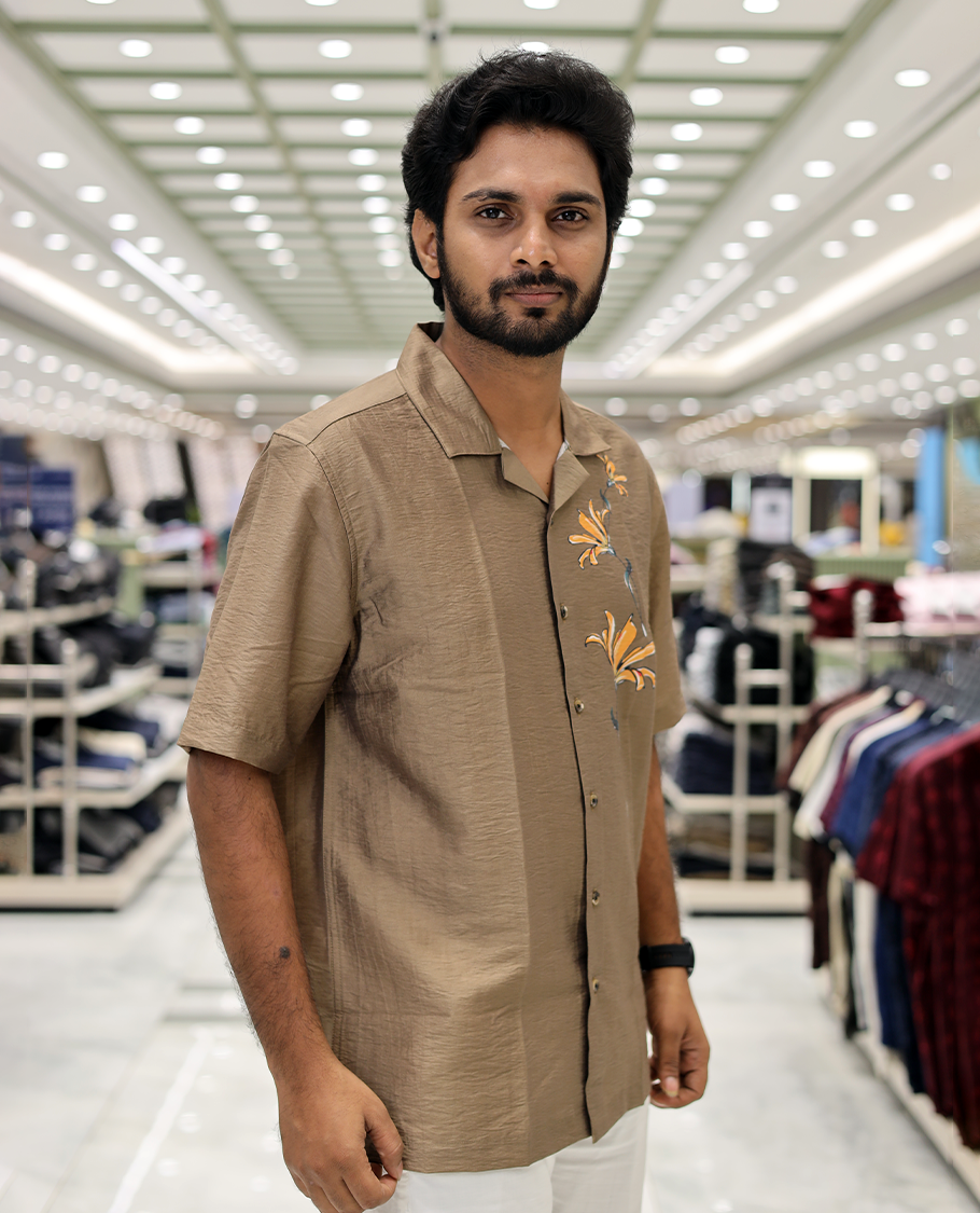 Brown Poly-Blended Causal Shirt, Comes with Floral Print, Half Sleeves, a Cuban Collar, a Boxy Fit, and Regular Length