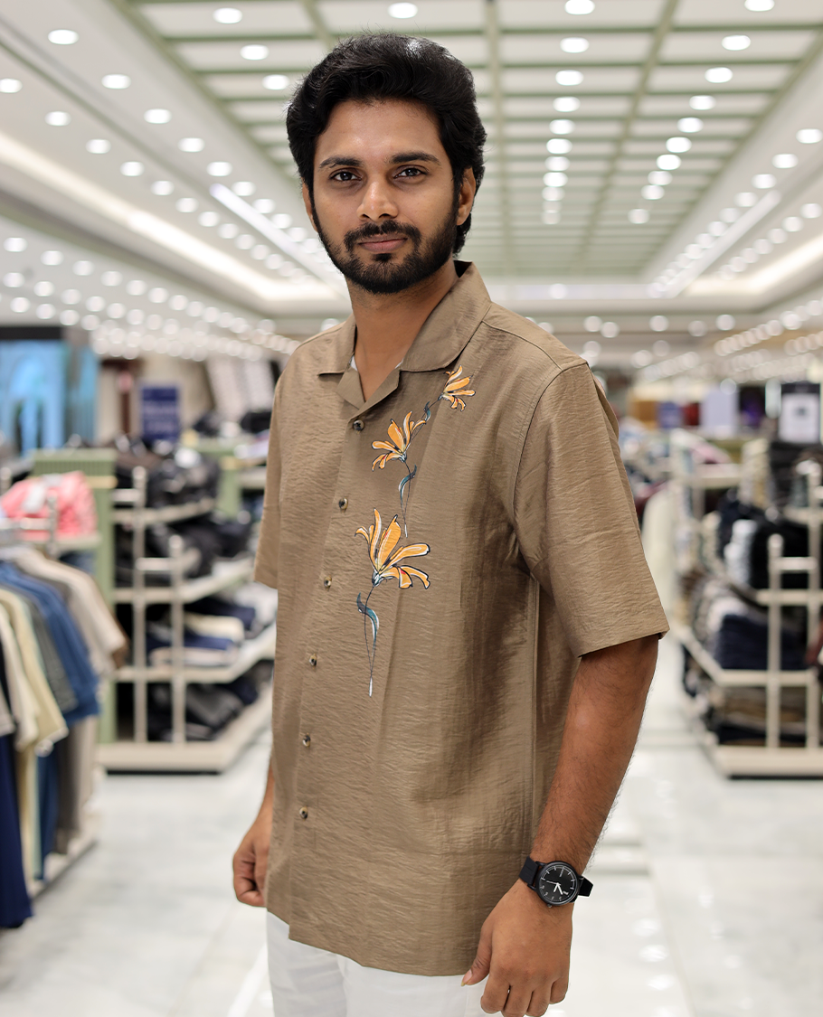 Brown Poly-Blended Causal Shirt, Comes with Floral Print, Half Sleeves, a Cuban Collar, a Boxy Fit, and Regular Length
