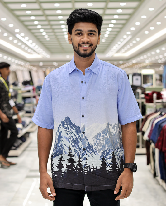 Blue Cotton-Blended Casual Shirt, Artfully Printed with Himalayan-Themed Snowfall Print, a Half-Sleeve, a Spread Collar, a Boxy Fit, and Regular Length