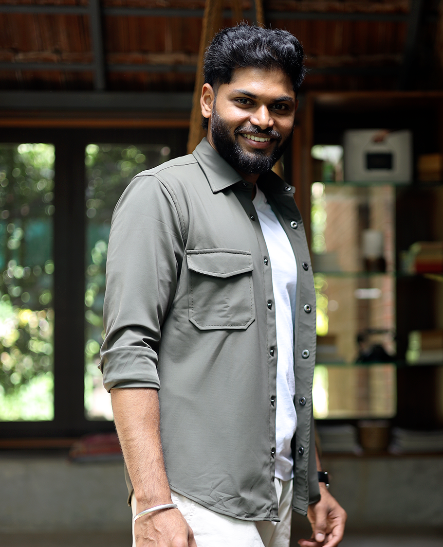 Green Solid Poly-Blended Casual Shirt Featuring Full Sleeves, a Spread Collar, a Slim Fit, and Regular Length