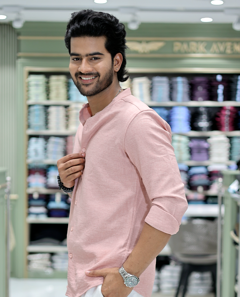 Pastel Pink Solid Cotton-Blended Casual Shirt Comes with Full Sleeves, a Mandarin Collar, a Regular Fit, and a Regular Length