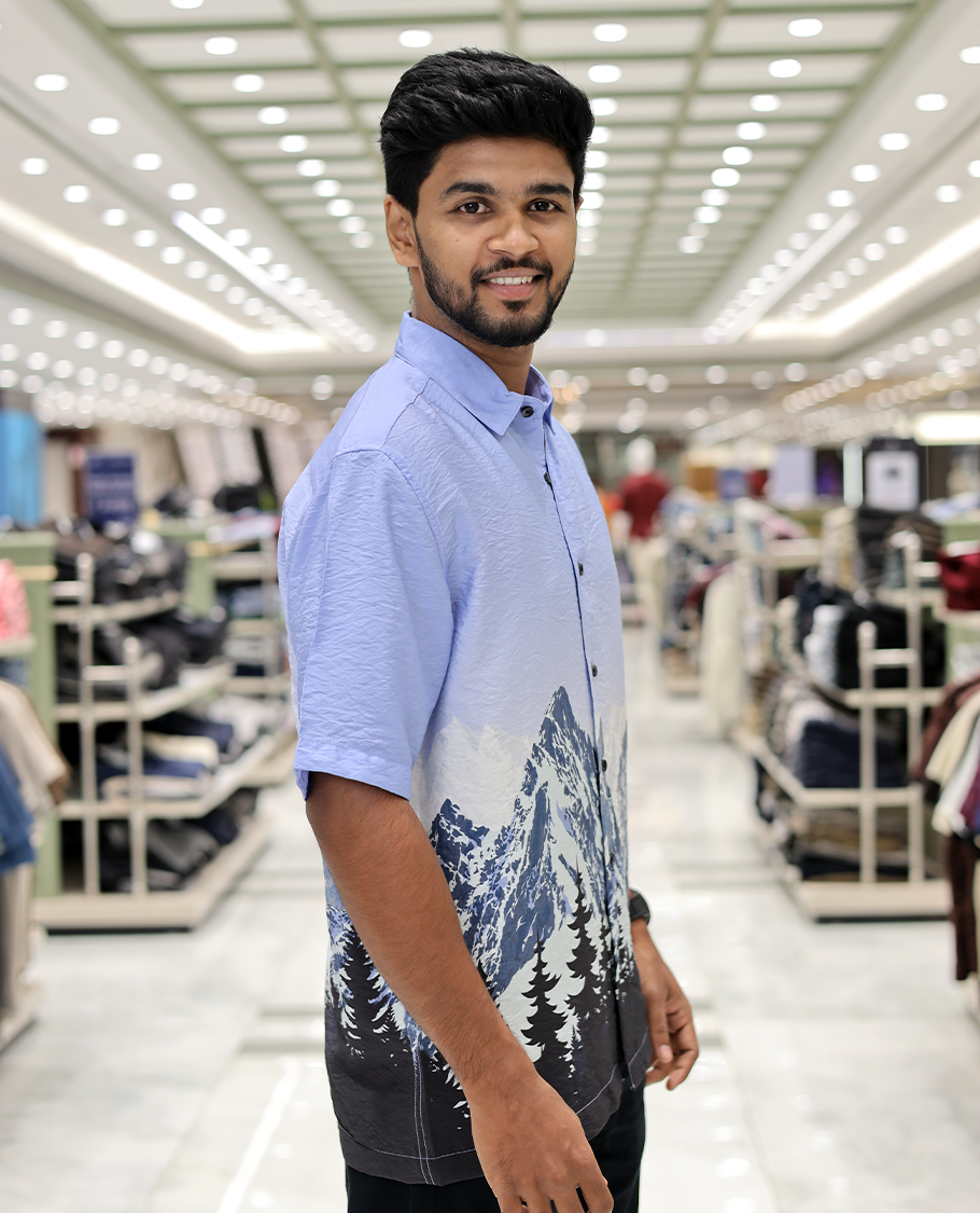 Blue Cotton-Blended Casual Shirt, Artfully Printed with Himalayan-Themed Snowfall Print, a Half-Sleeve, a Spread Collar, a Boxy Fit, and Regular Length