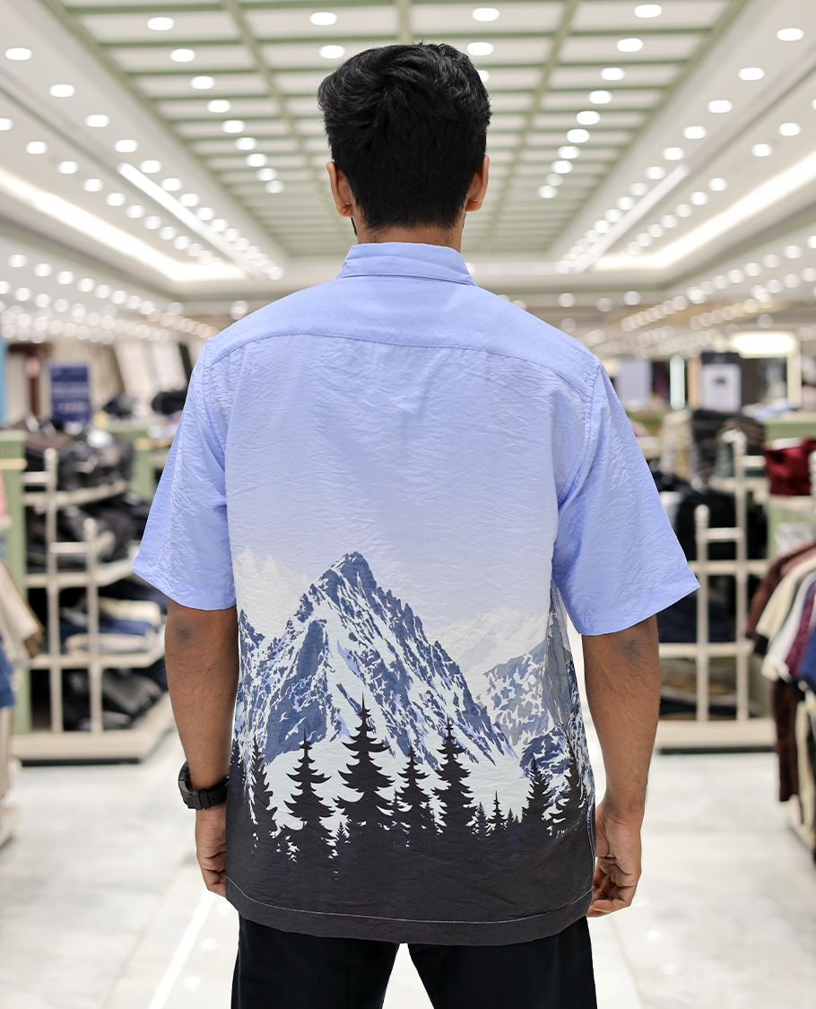 Blue Cotton-Blended Casual Shirt, Artfully Printed with Himalayan-Themed Snowfall Print, a Half-Sleeve, a Spread Collar, a Boxy Fit, and Regular Length