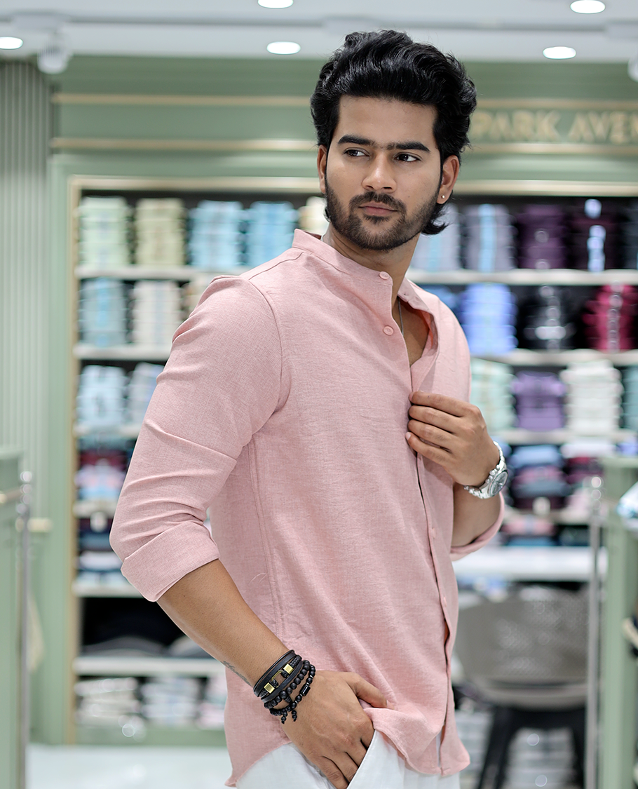 Pastel Pink Solid Cotton-Blended Casual Shirt Comes with Full Sleeves, a Mandarin Collar, a Regular Fit, and a Regular Length