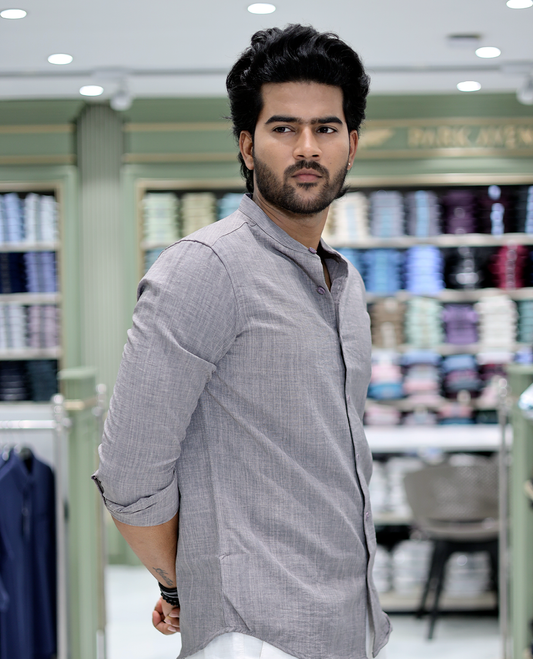 Grey Solid Cotton-Blended Casual Shirt Comes with Full Sleeves, a Mandarin Collar, a Regular Fit, and a Regular Length
