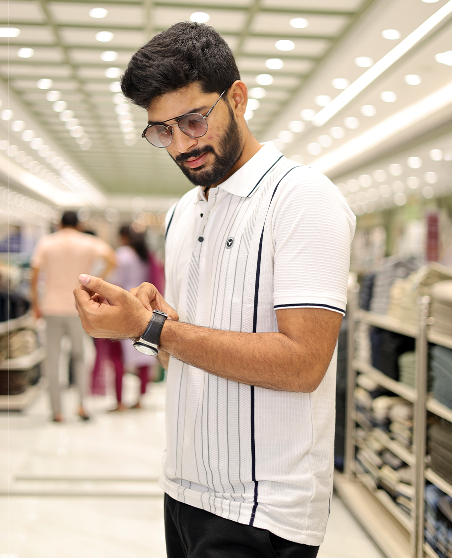White Striped Cotton-Blended T-Shirt Comes with Half-Sleeves, a Polo Neck, a Slim Fit, and Regular Length