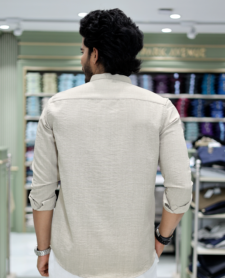 Taupe Solid Cotton-Blended Casual Shirt Comes with Full Sleeves, a Mandarin Collar, a Regular Fit, and a Regular Length