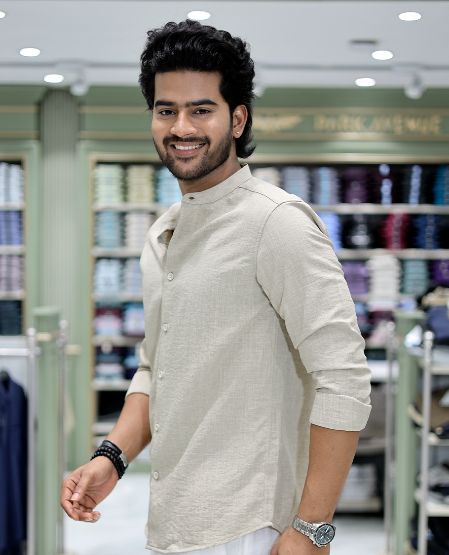 Taupe Solid Cotton-Blended Casual Shirt Comes with Full Sleeves, a Mandarin Collar, a Regular Fit, and a Regular Length