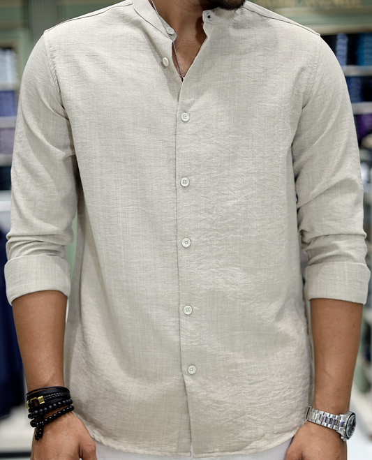 Taupe Solid Cotton-Blended Casual Shirt Comes with Full Sleeves, a Mandarin Collar, a Regular Fit, and a Regular Length