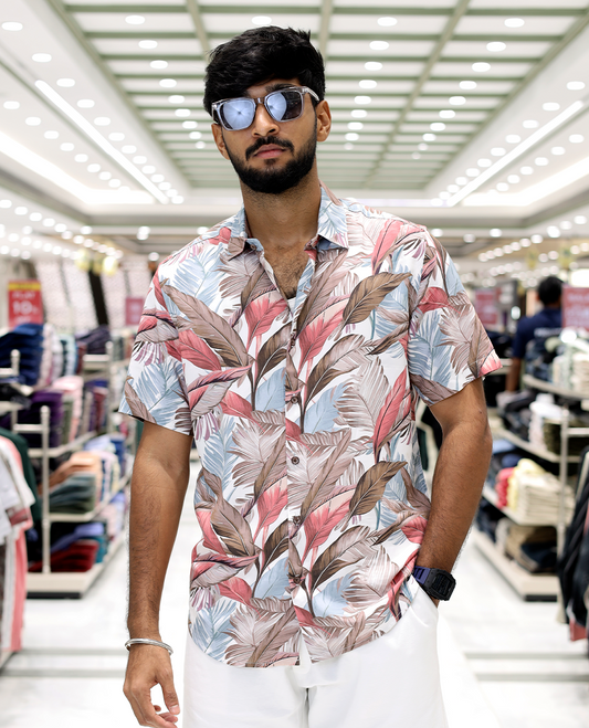 Pink Cotton-Blended Casual Shirt, Adorned with Tropical Floral Print, Half Sleeves, a Regular Fit, a Spread Collar, and Regular Length