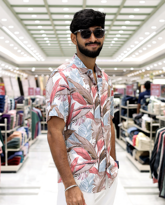Pink Cotton-Blended Casual Shirt, Adorned with Tropical Floral Print, Half Sleeves, a Regular Fit, a Spread Collar, and Regular Length
