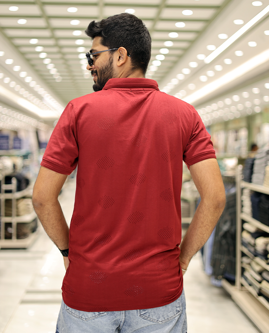 Red Textured Cotton-Blended Laser-Cut T-Shirt Comes with Half-Sleeves, a Polo Neck, a Slim Fit, and Regular Length