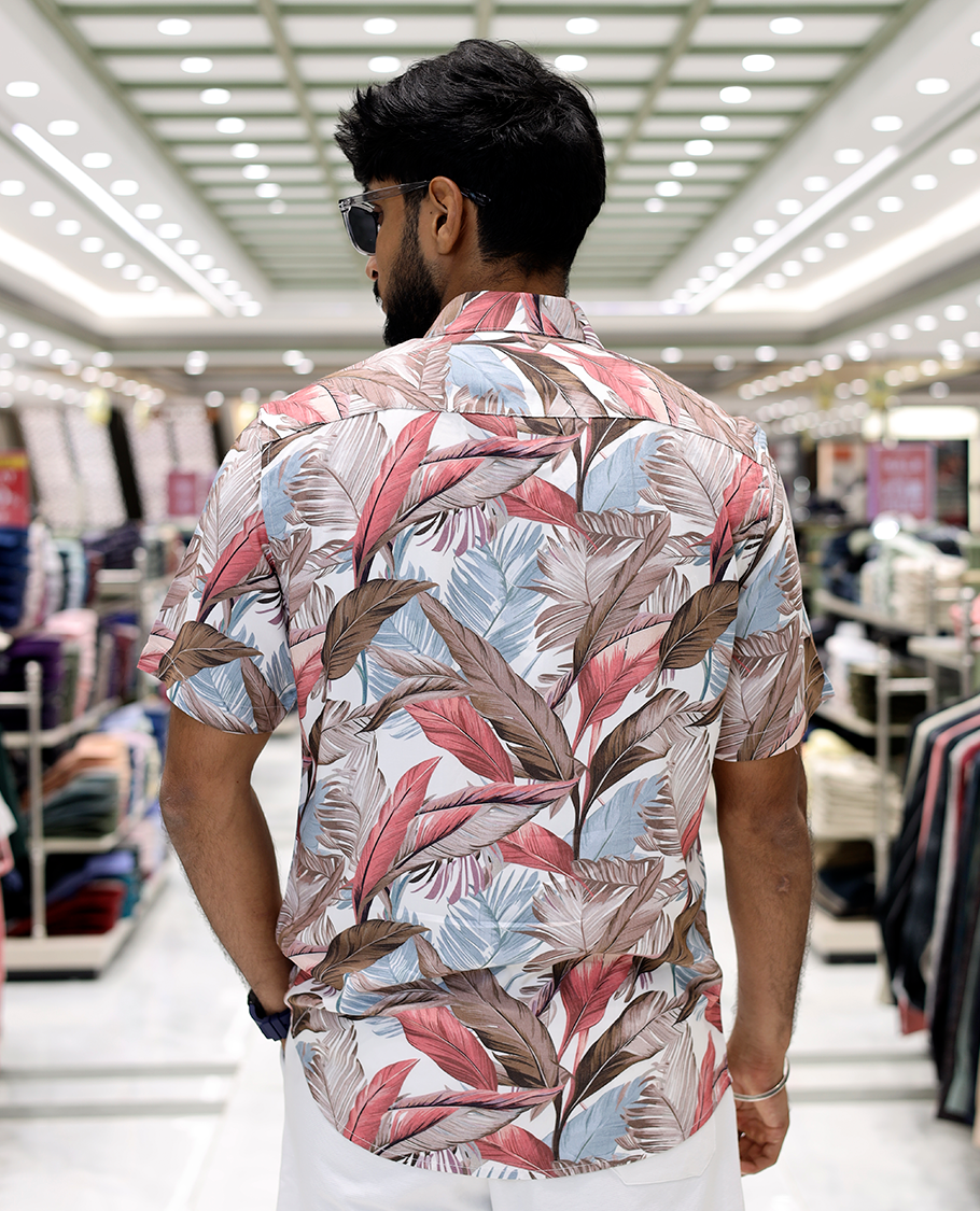 Pink Cotton-Blended Casual Shirt, Adorned with Tropical Floral Print, Half Sleeves, a Regular Fit, a Spread Collar, and Regular Length