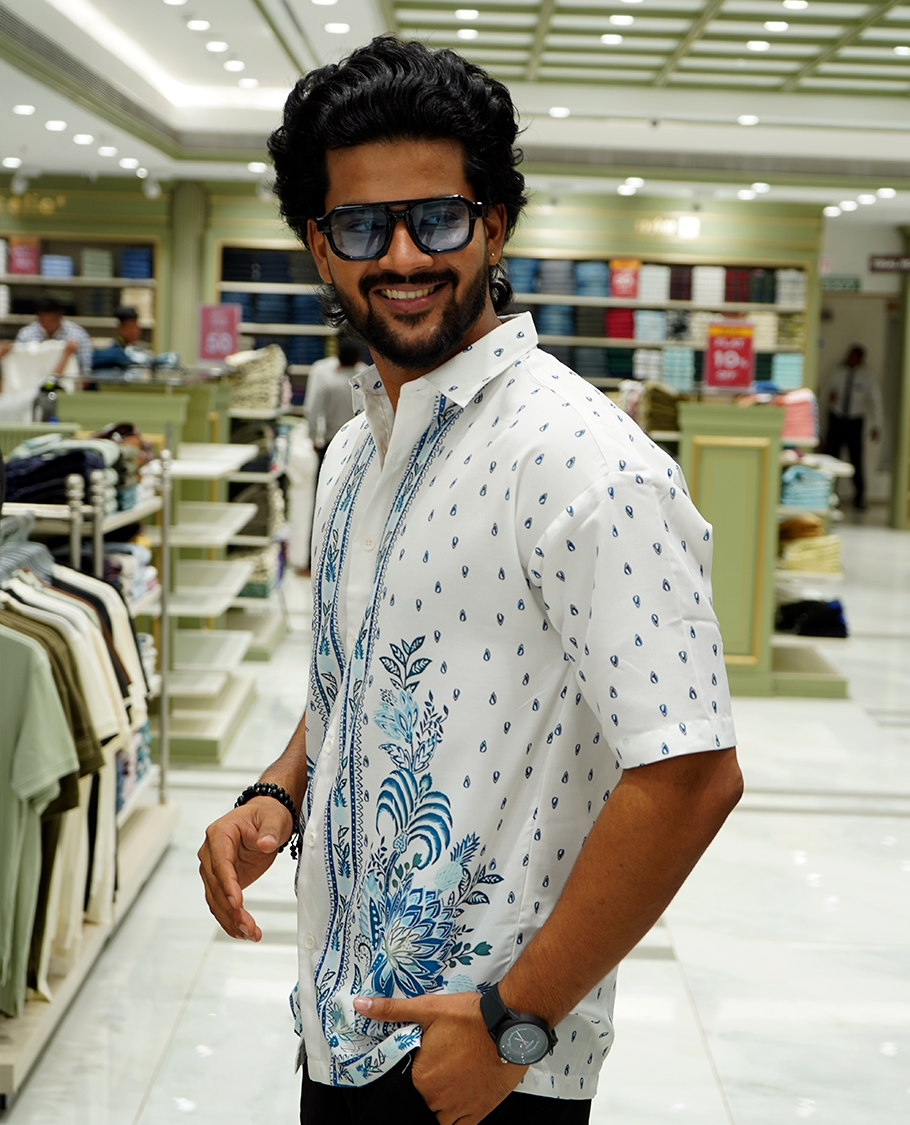 White Cotton-Blended Casual Shirt Features Tropical Floral-Paisley Print, Full Sleeves, a Spread Collar, a Slim Fit, and a Regular Length