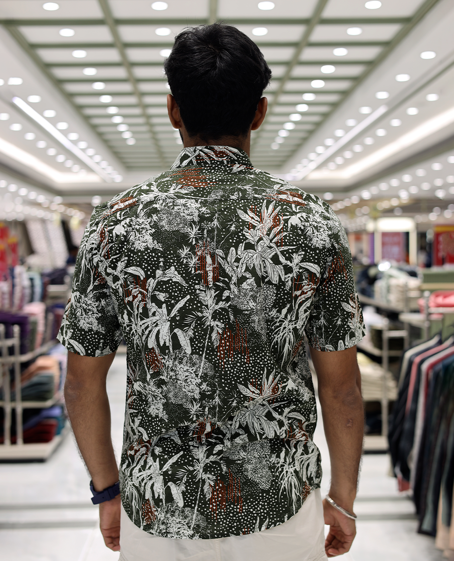 Green Cotton-Blended Casual Shirt, Accentuated with Tropical Floral Print, Half Sleeves, a Regular Fit, a Spread Collar, and Regular Length