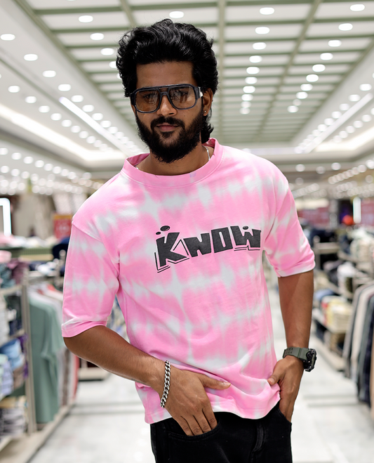 Pink Oversized Cotton-Blended T-Shirt Features an Abstract Dyed Typography Print, Half-Sleeves, Crew Neck, and Regular Length