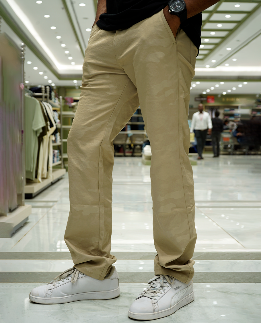 Cream Textured Lycra Traveller Trousers Comes with a Regular Fit and a Regular Length