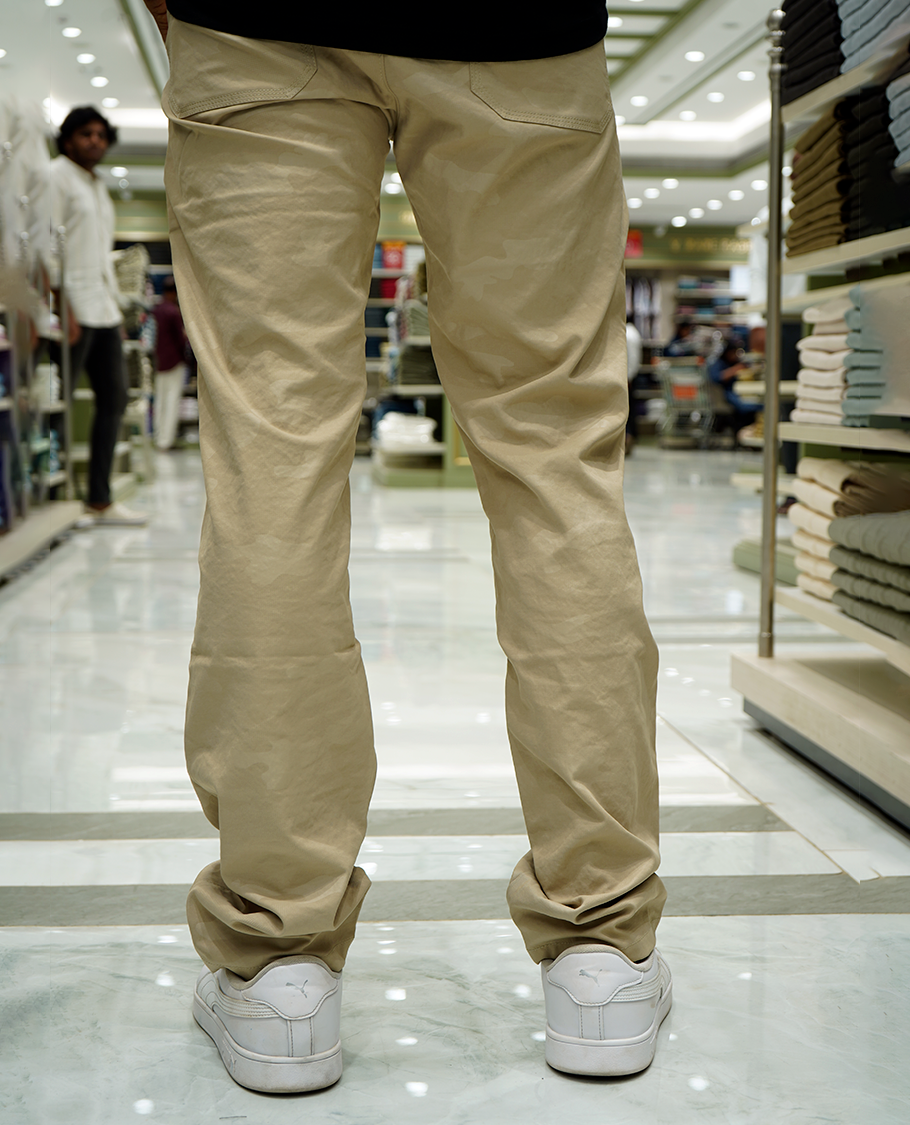 Cream Textured Lycra Traveller Trousers Comes with a Regular Fit and a Regular Length