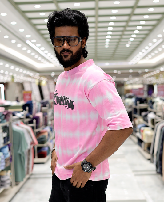 Pink Oversized Cotton-Blended T-Shirt Features an Abstract Dyed Typography Print, Half-Sleeves, Crew Neck, and Regular Length