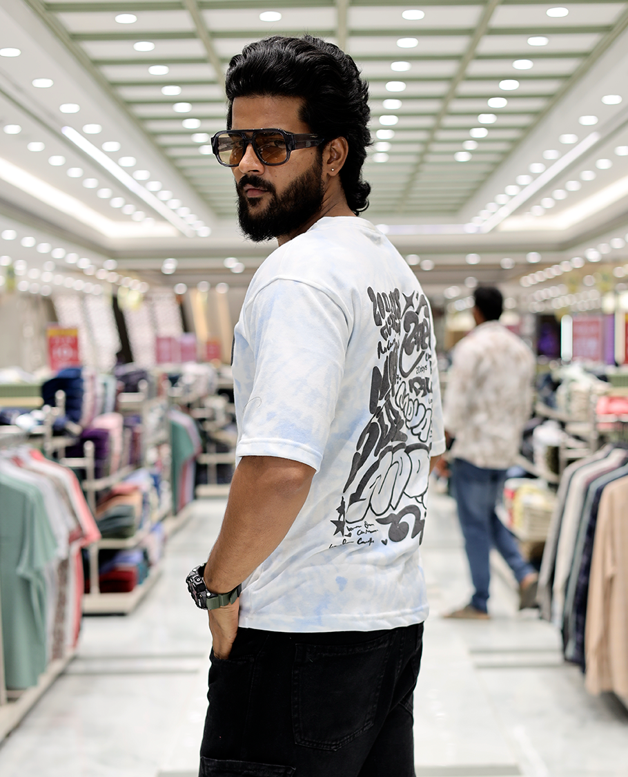 Light Blue Oversized Cotton-Blended T-Shirt Features an Abstract Dyed Typography Print, Half-Sleeves, Crew Neck, and Regular Length