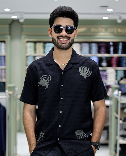 Black Cotton-Blended Casual Shirt Comes with Sea-Themed Embroidery, Half Sleeves, a Cuban Collar, a Boxy Fit, and a Regular Length