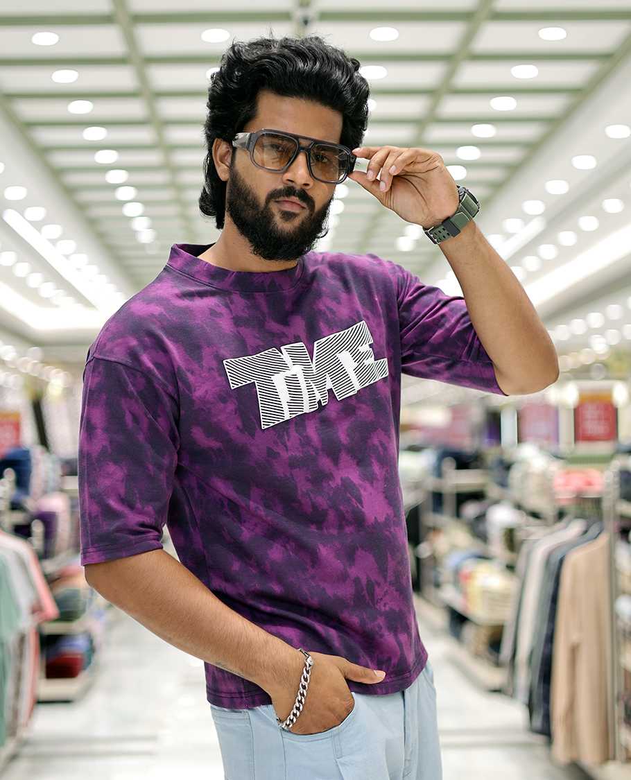 Purple Oversized Cotton-Blended T-Shirt Features an Abstract Dyed Typography Print, Half-Sleeves, Crew Neck, and Regular Length