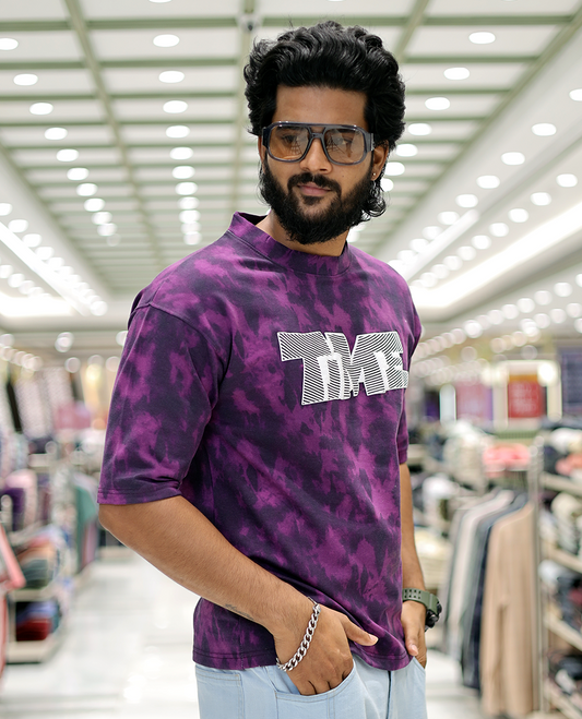 Purple Oversized Cotton-Blended T-Shirt Features an Abstract Dyed Typography Print, Half-Sleeves, Crew Neck, and Regular Length
