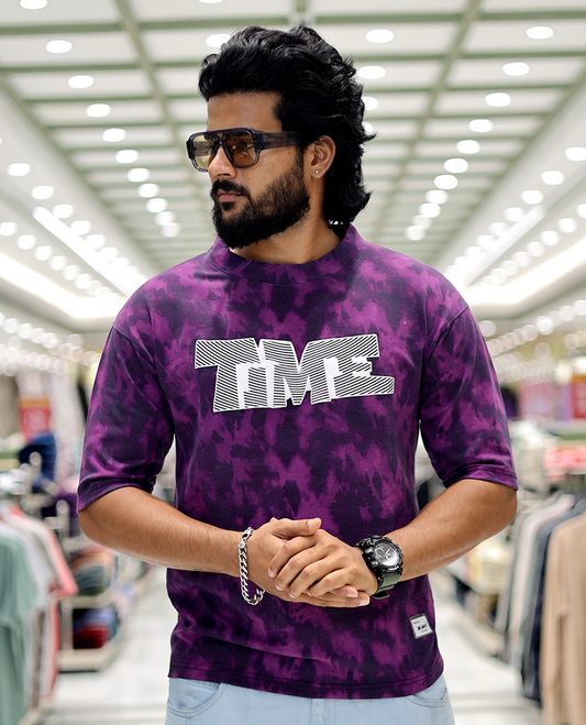 Purple Oversized Cotton-Blended T-Shirt Features an Abstract Dyed Typography Print, Half-Sleeves, Crew Neck, and Regular Length