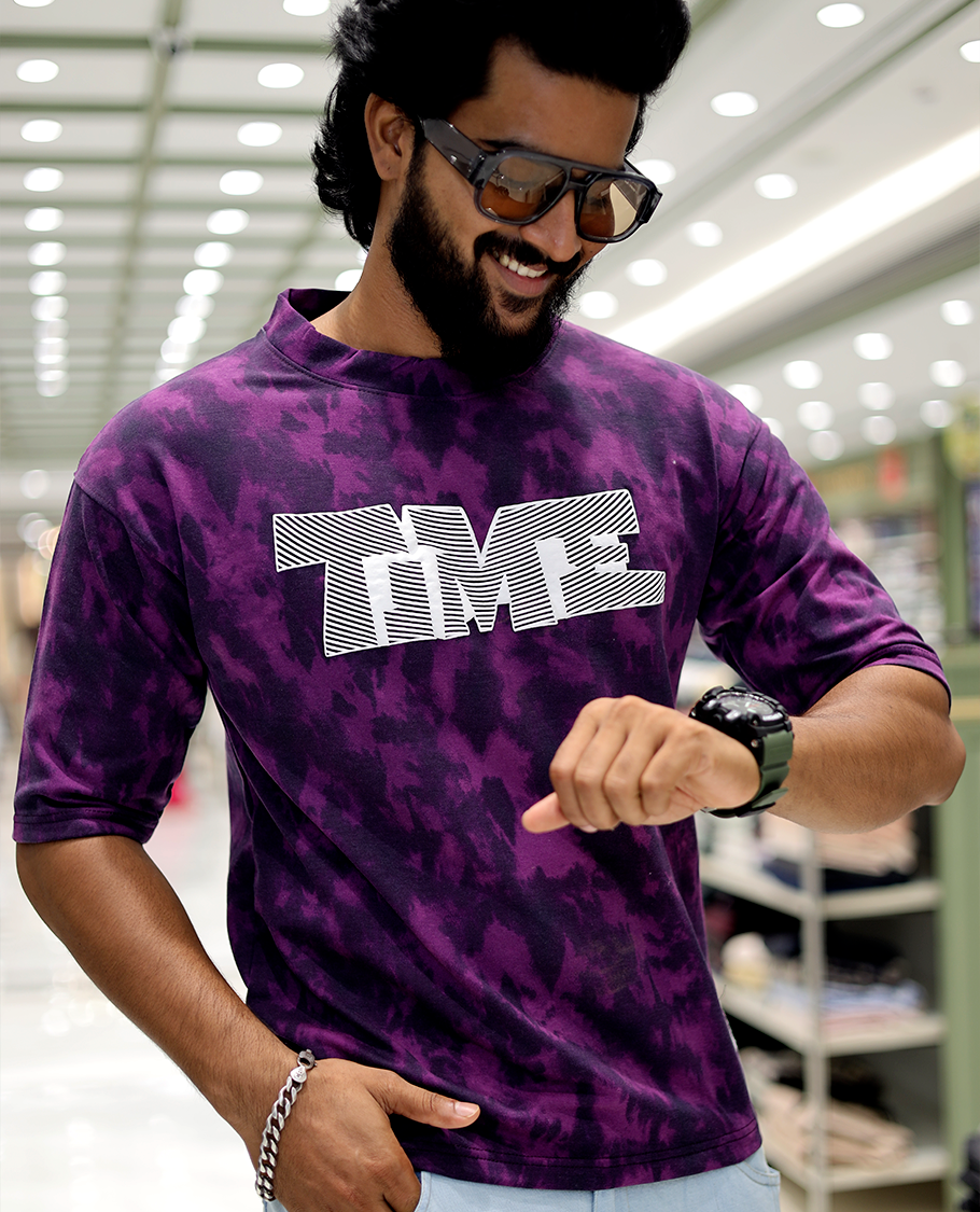 Purple Oversized Cotton-Blended T-Shirt Features an Abstract Dyed Typography Print, Half-Sleeves, Crew Neck, and Regular Length