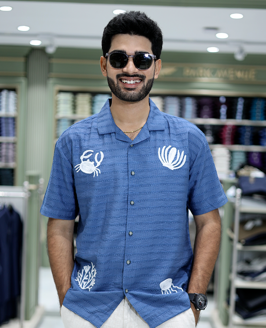 Blue Cotton-Blended Casual Shirt Comes with Sea-Themed Embroidery, Half Sleeves, a Cuban Collar, a Boxy Fit, and a Regular Length