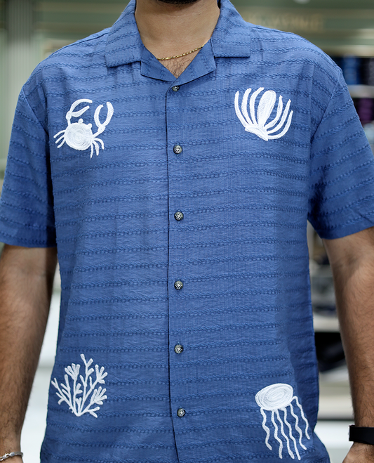 Blue Cotton-Blended Casual Shirt Comes with Sea-Themed Embroidery, Half Sleeves, a Cuban Collar, a Boxy Fit, and a Regular Length