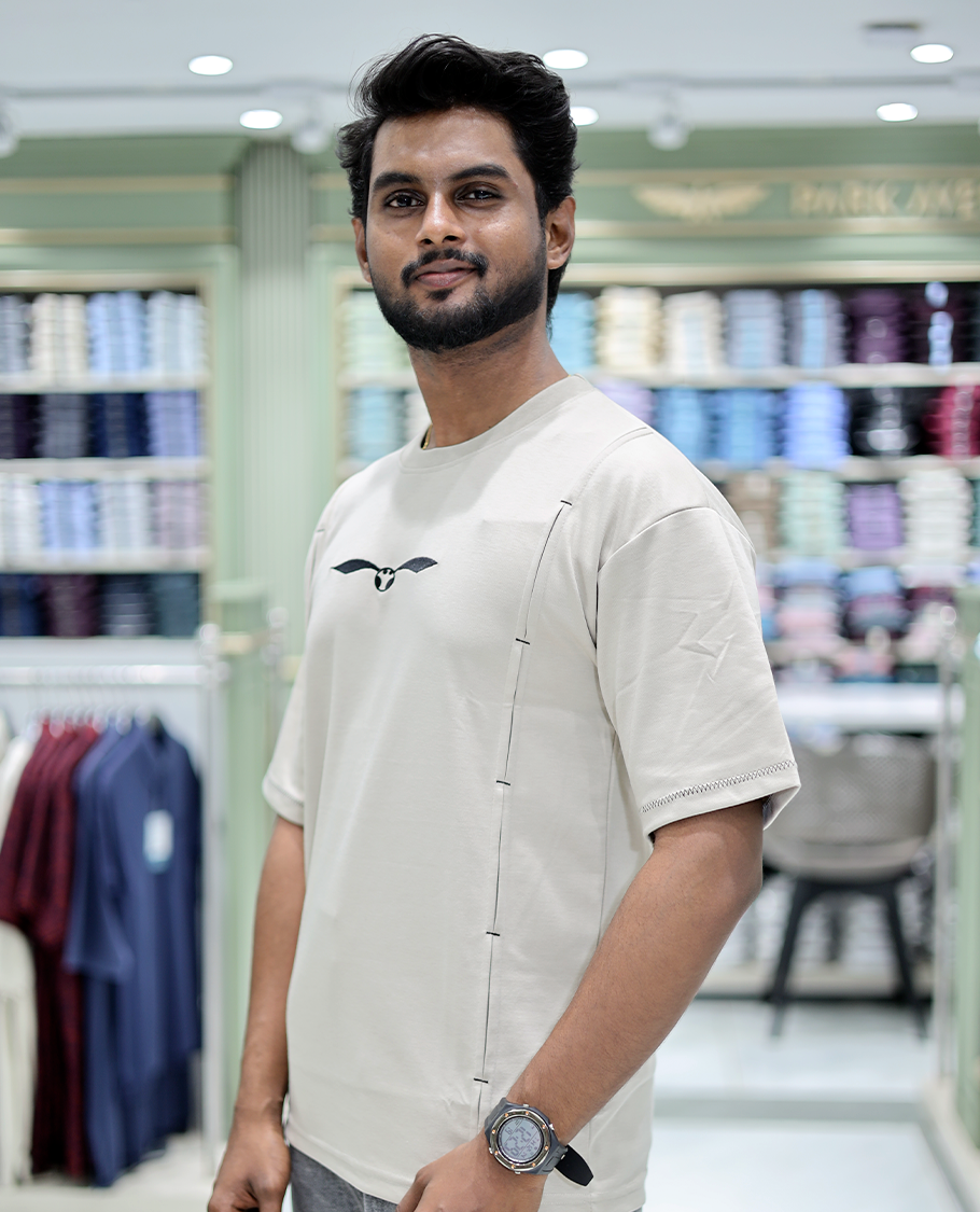 Cream Solid Cotton-Blended T-Shirt Features Half Sleeves, a Crew Neck, a Regular Fit, and a Regular Length