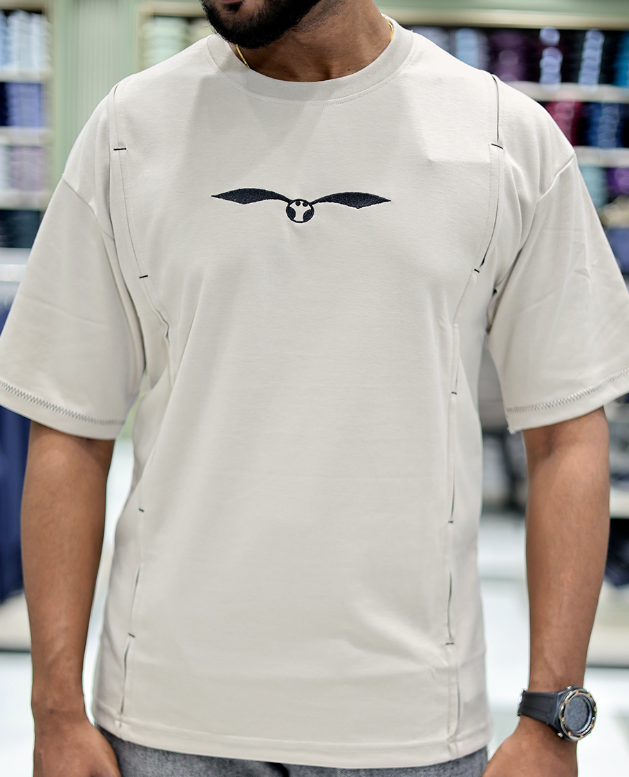 Cream Solid Cotton-Blended T-Shirt Features Half Sleeves, a Crew Neck, a Regular Fit, and a Regular Length