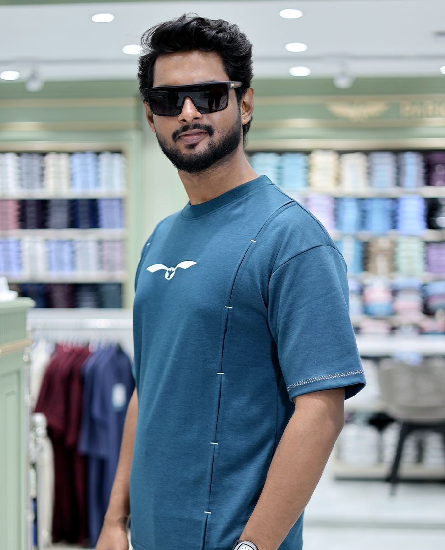 Teal Solid Cotton-Blended T-Shirt Features Half Sleeves, a Crew Neck, a Regular Fit, and a Regular Length