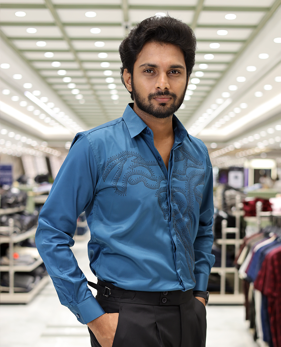 Peacock Blue Poly-Blended Party Wear Shirt, Features Vines-Themed Stone Work, Full Sleeves, a Spread Collar, Slim Fit, and Regular Length 
