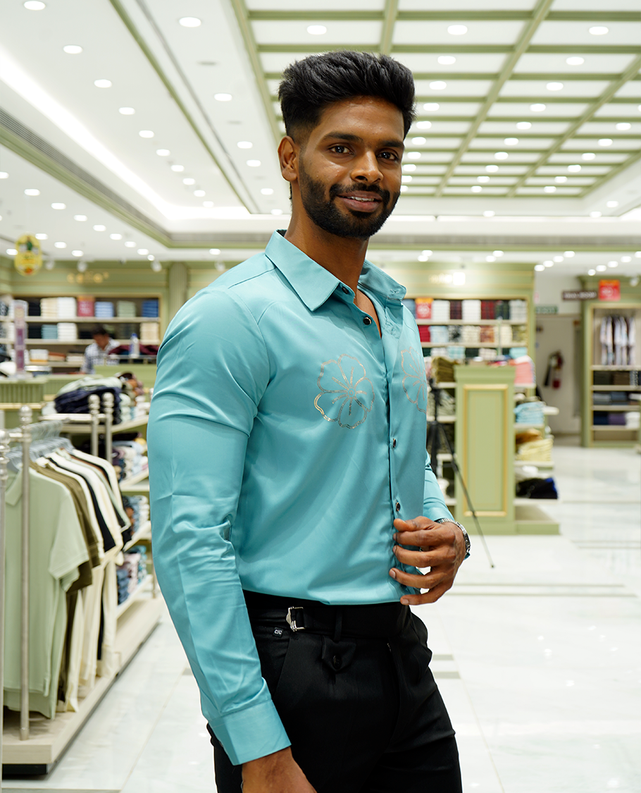 Teal Designer Party Wear Shirt Features Flower Work, a Spread Collar, Full Sleeves, a Slim Fit, and Regular Length