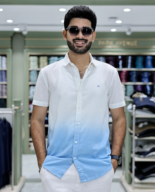 Blue Cotton-Blended Ombre Casual Shirt Features Half Sleeves, a Spread Collar, a Regular Fit, and a Regular Length