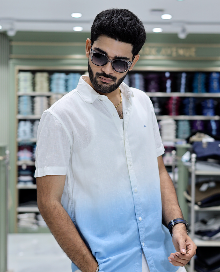 Blue Cotton-Blended Ombre Casual Shirt Features Half Sleeves, a Spread Collar, a Regular Fit, and a Regular Length