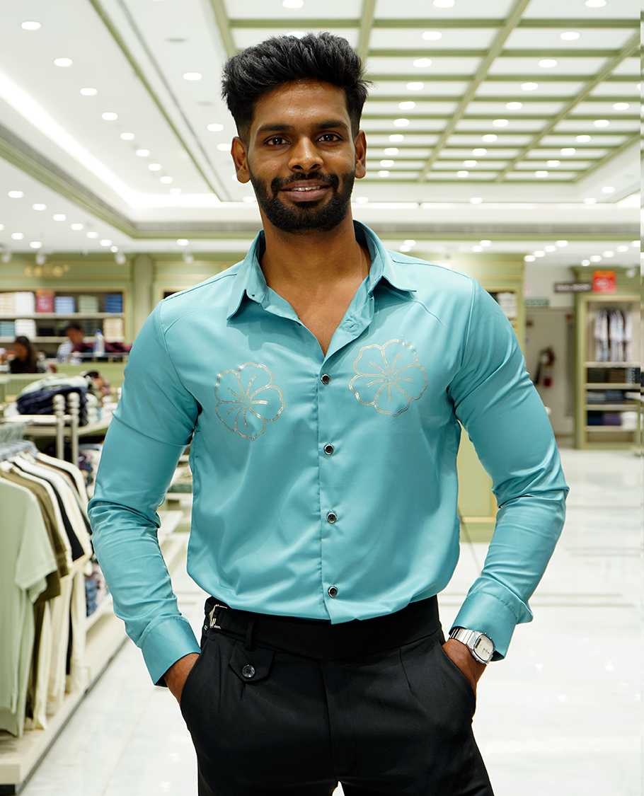 Teal Designer Party Wear Shirt Features Flower Work, a Spread Collar, Full Sleeves, a Slim Fit, and Regular Length