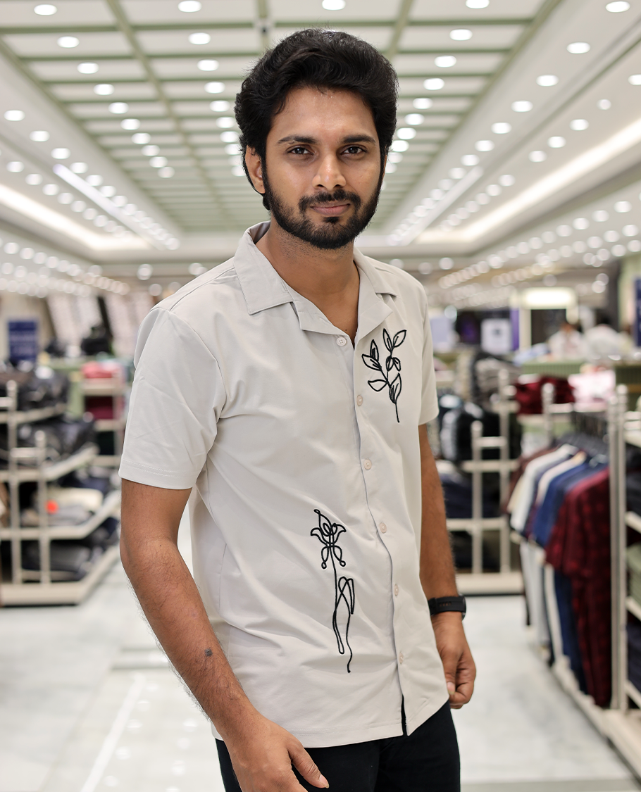 Cream Cotton-Blended Casual Shirt Comes with Leaf Motifs Outline Knitted Embroidery, Cuban Collar, Half Sleeves, Boxy Fit, and Regular Length