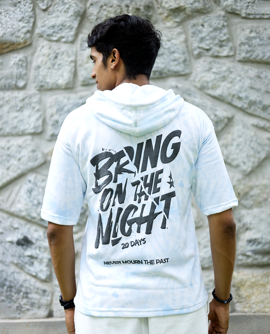 Light Blue Cotton-Blended Oversized Hooded T-Shirt Features Abstract Dyed Typography Print, Half-Sleeves, and Regular Length