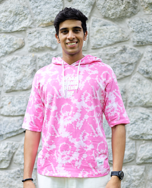 Pink Cotton-Blended Oversized Hooded T-Shirt Features Abstract Dyed Typography Print, Half-Sleeves, and Regular Length